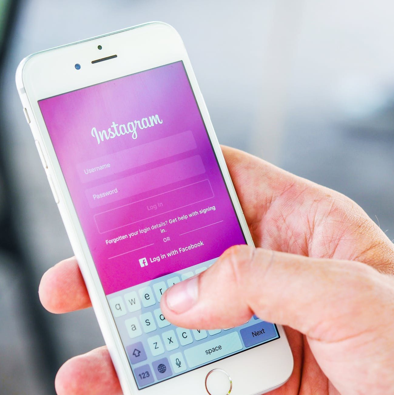 Phone pulling up Instagram