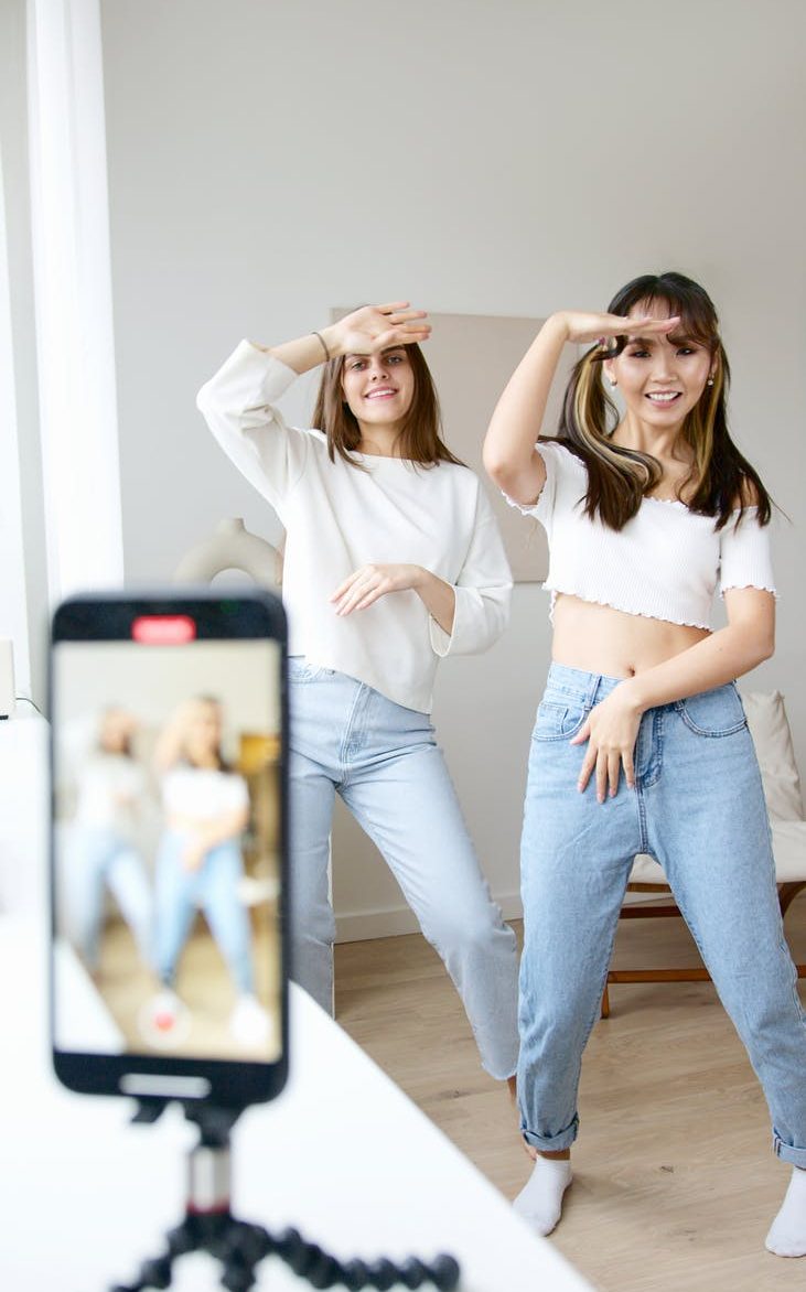 Girls dancing and recording a TikTok
